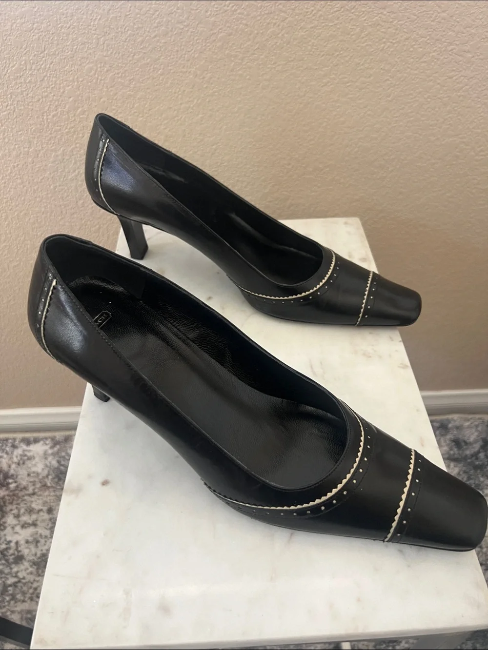 Coach Black Leather Pointed Toe Heels with Metallic Accent